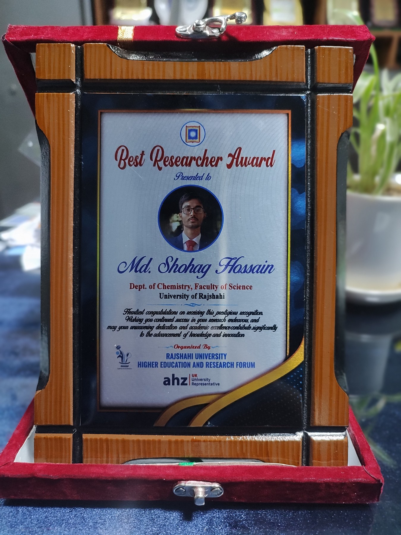 Best Researcher Award plaque presented to Md. Shohag Hossain by the Rajshahi University Higher Education and Research Forum.